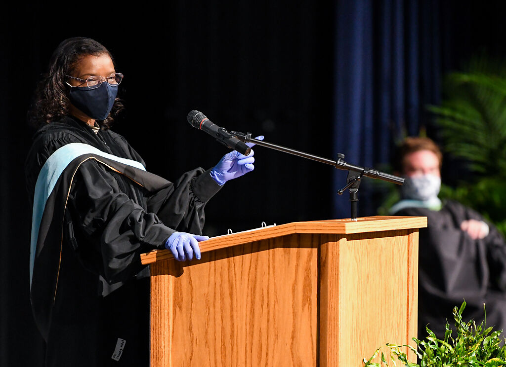Columbia Public Schools board member Della Streaty-Wilhoit addresses graduates and guests